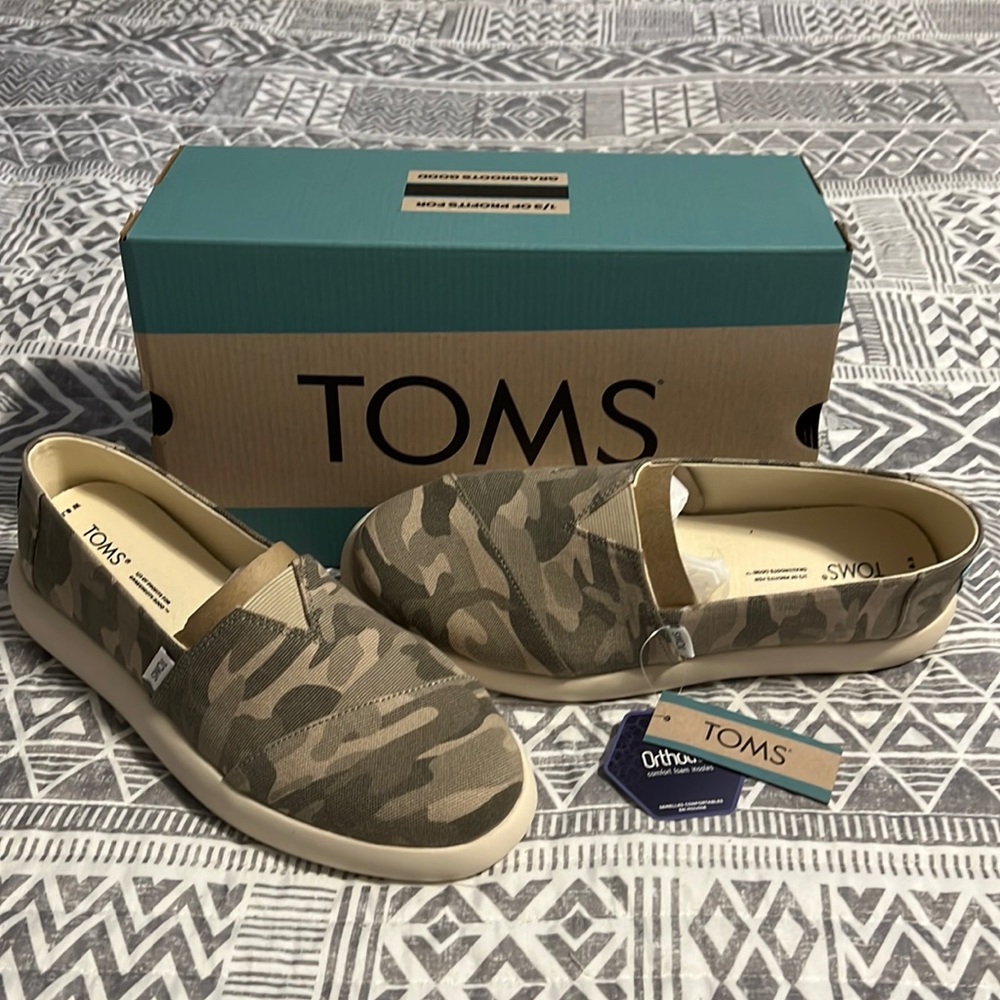 Brand new Toms slip on camouflage shoes